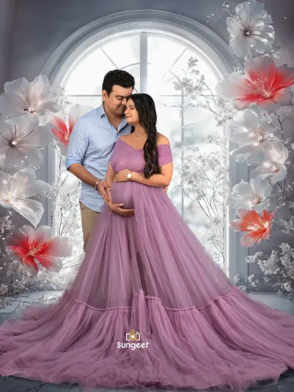 A fairytale moment for this expecting couple. They are framed by our magical winter-themed window prop with giant glowing flowers.