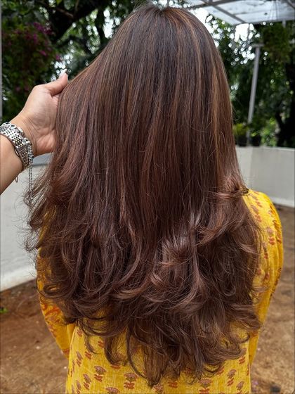 This custom color is what I call 'Iced Mocha Frappuccino'. It’s a cool, ashy brown with very fine, subtle highlights that give it a modern and chic vibe. Perfect for someone who wants a change without being too loud.