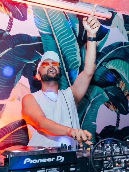 One hand on the deck, one hand in the air. This is me, fully engaged and leading the party from the front.