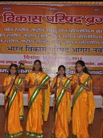 This photo captures our student group at the Bharat Vikas Parishad competition in 2014. They are performing 'Jai Bharat Janani,' a composition I created in Raag Vrindavani Sarang, which highlights our focus on classical-based compositions.