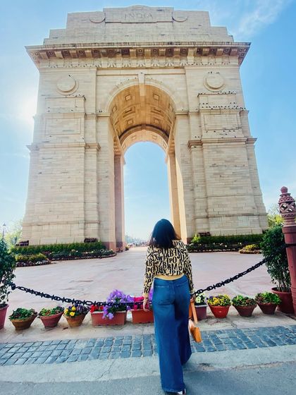 A day out at India Gate in Delhi. I paired a trendy printed top with wide-leg jeans for a comfortable and stylish look perfect for exploring the city's monuments.