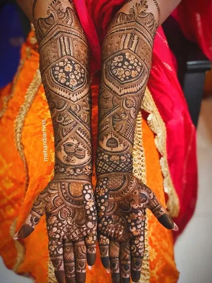 A slightly different angle of the same intricate design, showing how the patterns wrap around the hands and arms for a complete look.