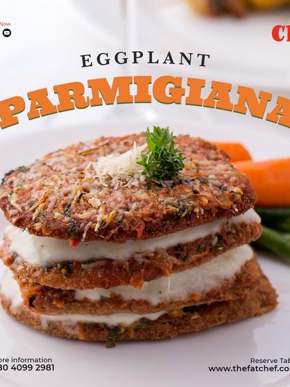A true Italian masterpiece on your plate. Our Eggplant Parmigiana is layered with cheese and a rich tomato sauce, a hearty vegetarian option.