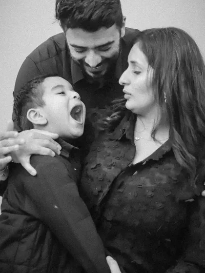 This is the real stuff. The big, loud, joyful yawns and the playful chaos. We don't aim for perfect smiles in every shot; we aim to capture the true spirit of your family, just as you are.