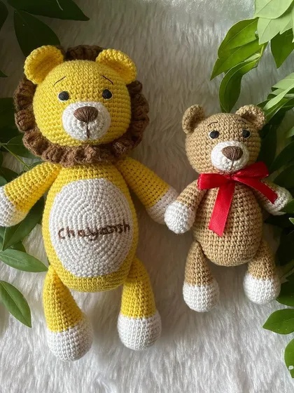 A personalized lion plushie with the name "Chayansh" embroidered on his belly. This sunny yellow lion is ready to be a brave and loyal friend.
