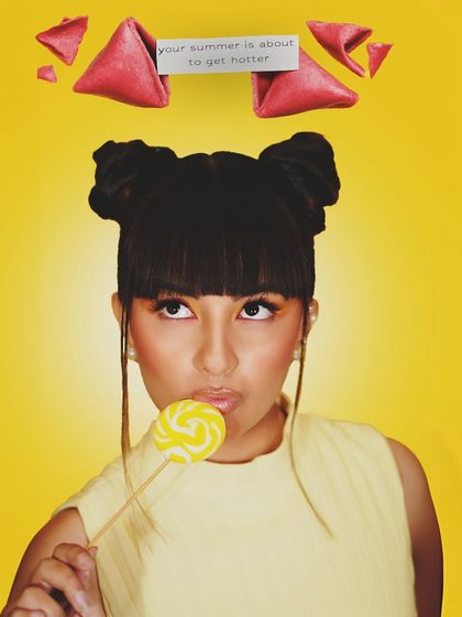 A playful and creative shot for our "Summer Edit," with a fortune cookie message saying "your summer is about to get hotter."