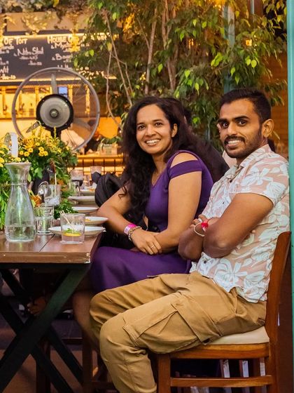 A happy couple enjoying their time at Roxie, where every meal is an opportunity to connect.