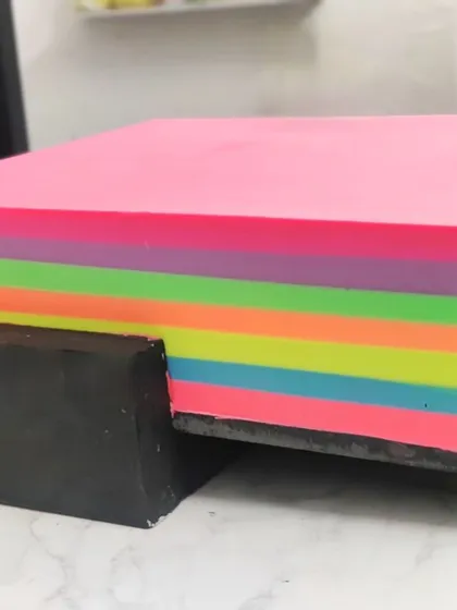 Cutting a fresh slab of my layered Frozen Yogurt soap. The bright, neon colors are so cheerful and fun to work with.