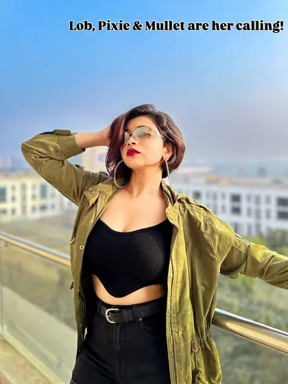 Channeling that 'baddie' energy with a short haircut and a powerful look. My styling is all about boosting your confidence, whether it's through a soft, feminine look or something bold and edgy like this. It's about finding the style that feels like you.