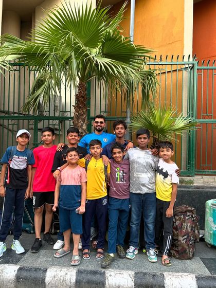 The team together after a long day of travel and cricket. These tours build strong bonds between the players.