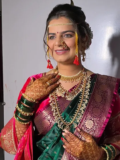 A happy bride, confident in her look. The makeup is set to last through all the smiles and happy tears of the day.