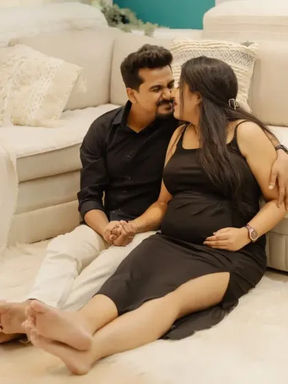 A cozy and intimate moment on the floor. Holding hands and sharing a quiet moment makes for a beautiful and authentic portrait.