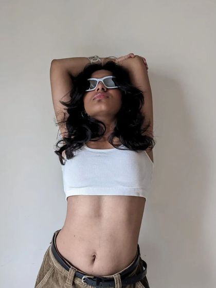 A close-up from the "Phoenix" shoot, showing the details of the styling.