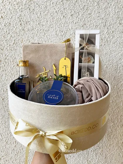 My Eid and Ramadan hampers are curated with spiritual and thoughtful touches. This velvet box includes premium dates, attar, a beautiful scarf, and other essentials to make the celebration truly special.