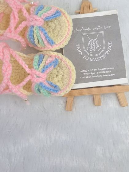 The pastel gladiator sandals, displayed with my branding card, are a perfect example of my more unique and stylish designs.