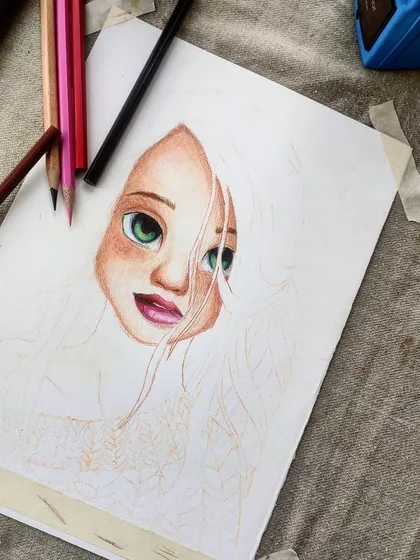 The first WIP of the cute, semi-realistic girl, showing just her face colored in.