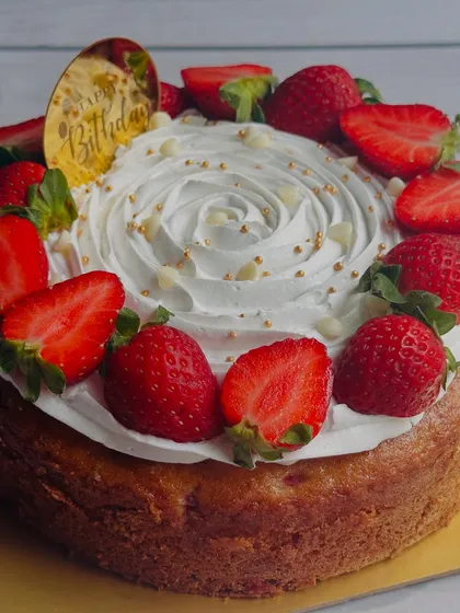 My Strawberry Tea Cake is a celebration of the fruit. A fluffy cake base is topped with a beautiful rosette of whipped cream and decorated with fresh, juicy strawberries.