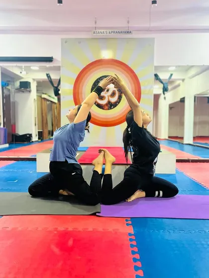A partner version of Eka Pada Rajakapotasana (One-Legged King Pigeon Pose). This allows both students to find a deeper backbend and heart-opening stretch together.
