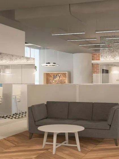 A 3D render of a breakout lounge in the Umicore office. The design includes a vertical green wall and comfortable seating, creating a refreshing space for employees to relax and collaborate.