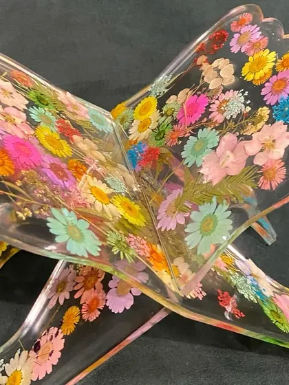 A truly unique piece, this Quran stand is made from clear resin with real, colorful flowers preserved within. It’s a vibrant and joyful expression of faith, customized for a client who wanted something special and full of life.