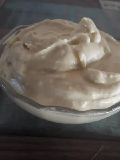 A bowl of my newly developed vegan cheese sauce. It's thick, creamy, and has that savory flavour that is perfect for using in dishes like Khachapuri, pasta, or as a dip.