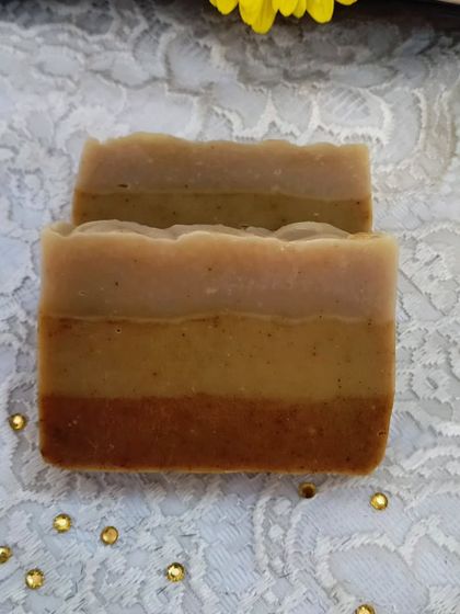 A stack of Fresh & Juicy soap bars. The layers are created with natural colorants, and the scent is pure sunshine.