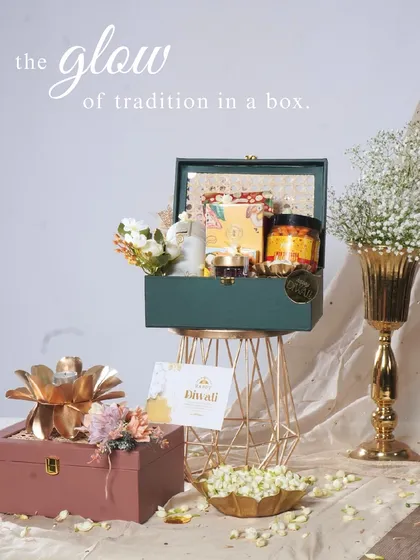 A complete view of our festive collection, featuring the emerald green and dusty rose trunks. These hampers are designed to bring the glow of tradition to your celebrations.