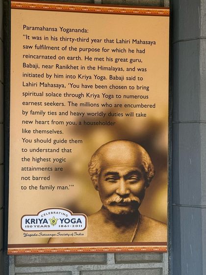 A poster of Lahiri Mahasaya, the disciple chosen by Babaji to bring Kriya Yoga to the world. His example as a householder yogi shows that spiritual attainment is possible for everyone.