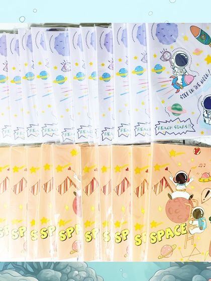 A batch of space-themed file folders, perfect for keeping school papers organized. These were part of a mixed-theme mermaid party order.