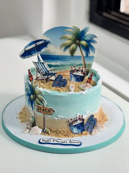 Beach vibes, but make it cake. This design brings a relaxing beach scene to life with palm trees, an umbrella, and even a cooler of beers, perfect for someone who loves the sea.