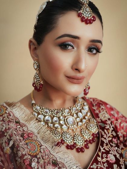 A beautiful portrait that captures the shimmer on the eyelids and the glow on the skin. You will learn how to use different textures like matte, shimmer, and gloss effectively.