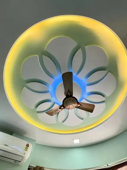 A different perspective of the floral ceiling design, showing its placement in the room relative to the window and air conditioner. This is a great way to add character to a simple room.