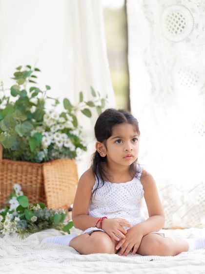 A quiet, thoughtful portrait of a young girl during our picnic setup. Even the in-between moments are beautiful and worth preserving.