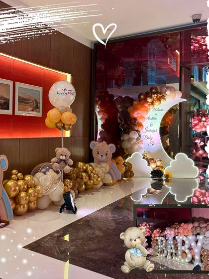 A collage showing various elements of a gold and brown teddy bear baby shower, including the crescent moon backdrop, balloon decor, and custom 'BABY' blocks.