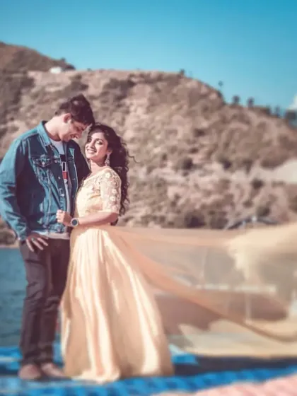 A dreamy, romantic shot by the lake, with the bride's flowing dress adding a touch of magic to the scene.