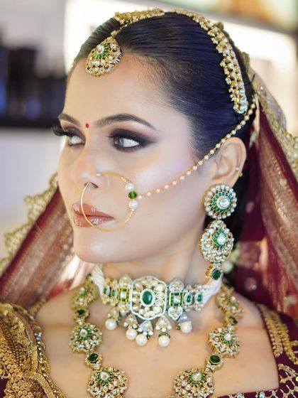 A close-up on the eye makeup for my 'Shringar' bride. The sharp, winged liner and shimmering eyeshadow create a captivating look, balanced with perfectly sculpted brows.