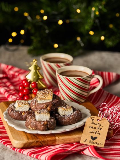 Our Rocky Road Cookies, topped with torched marshmallows, are the perfect treat to leave out for Santa. They are chewy, chocolatey, and packed with nuts and marshmallows.