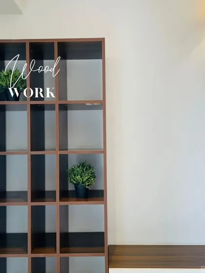 We offer amazing options in woodwork. This open-shelf wooden bookcase provides a versatile storage and display solution with a modern grid design.