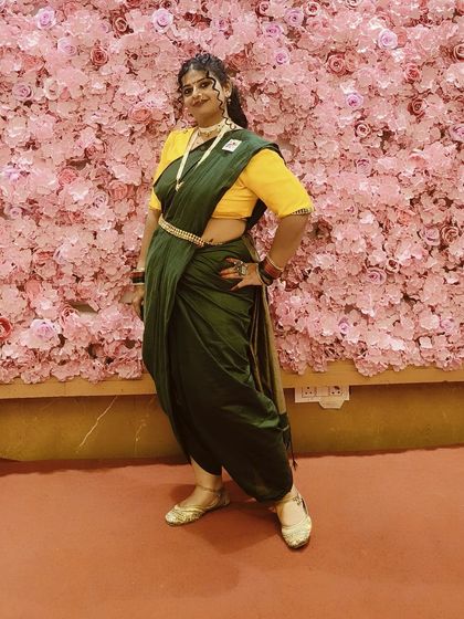 A stunning Maharashtrian-style look. We draped the saree in the traditional way and created a bold makeup look to match the festive vibe.