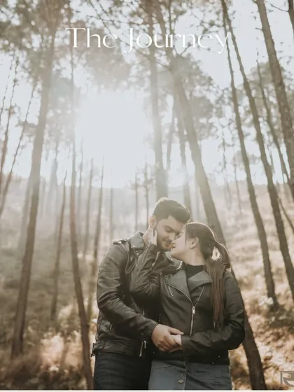 An intimate moment captured amidst the towering pines and misty sunlight of the mountains. This style is perfect for adventurous couples seeking a romantic, nature-filled pre-wedding session in a location like Himachal.
