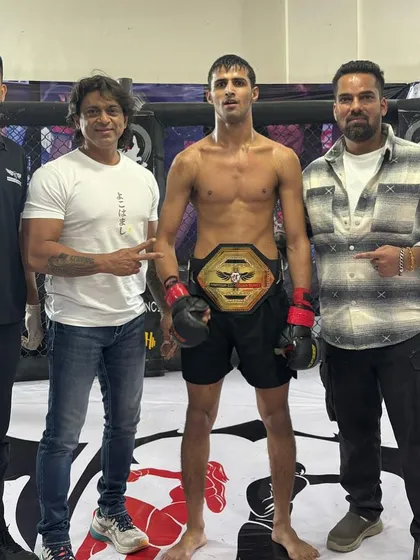 And the new Undisputed Bantamweight Champion. Nilesh Choudhary with the belt he earned through relentless hard work. This is the goal, and we help you achieve it.