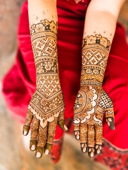 The palm view of the same design, featuring a different set of intricate floral and paisley patterns.