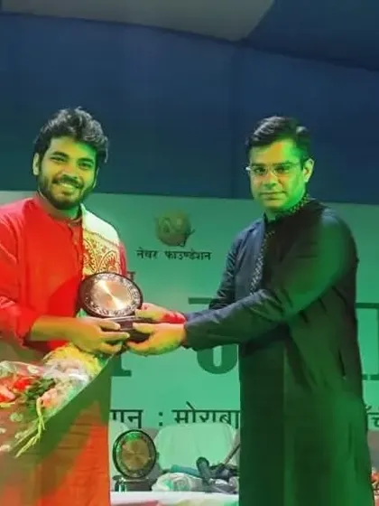 Receiving a memento at the Environment Fair in Ranchi. Thank you for the warm hospitality.