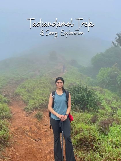 A lone trekker on the path to Tadiandamol peak. The trail offers beautiful views of the Coorg landscape.