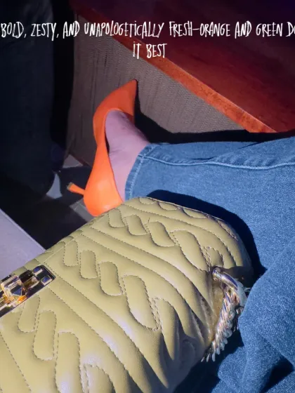 A close-up on a bold color combination. The zesty orange of the heels paired with the fresh green of the bag creates a vibrant and unapologetically fresh look. Don't be afraid to play with color.
