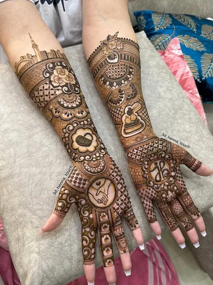 Your love story is unique, and your mehndi should be too. For this bride, I incorporated the Dubai skyline, a place special to her, along with the couple's initials and a symbol of their bond.