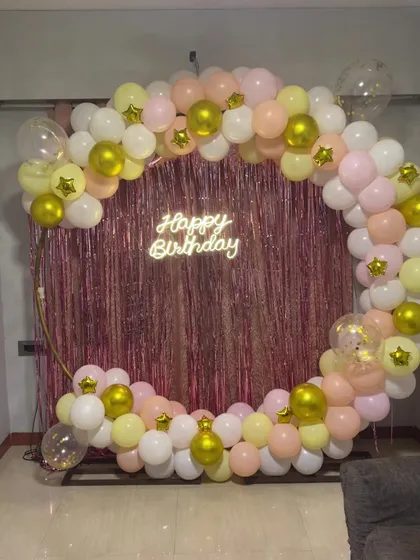 Another angle of the pastel and rose gold balloon ring, showing the confetti balloon detail.