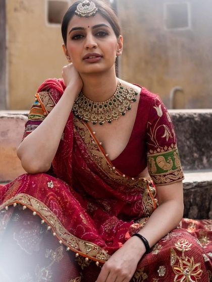 The perfect bridal portrait. This designer lehenga features beautiful embroidery and a classic silhouette for the modern bride.