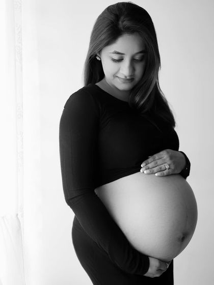 In the quiet moments, we connect with wonder. This black and white bare belly portrait is all about the beautiful glow and grace of this mama-to-be.