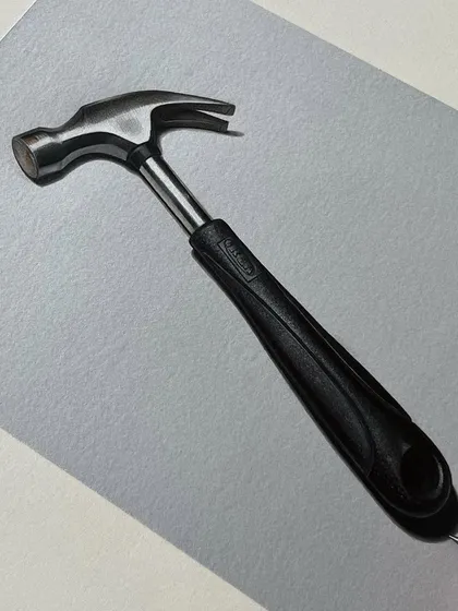 A finished realistic drawing of a hammer. I used a mix of markers and colored pencils to render the shiny metal head and the matte rubber handle.